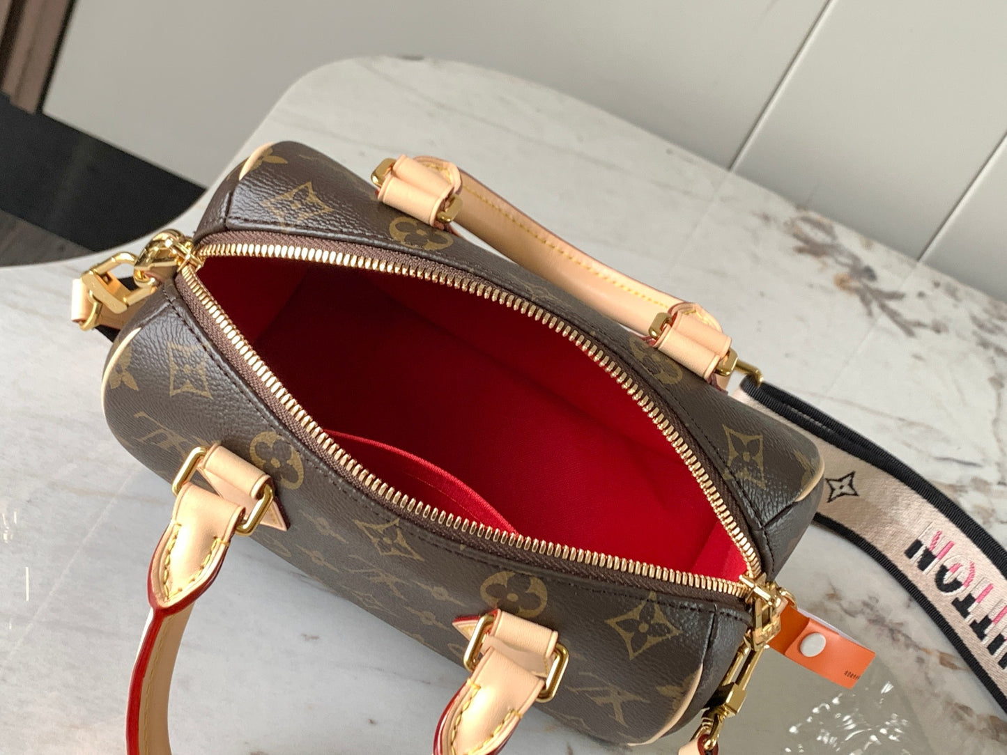SPEEDY BANDOULIÈRE 20 HANDBAG M46234